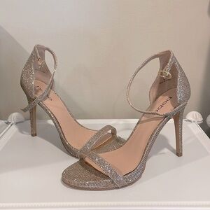 Bebe metallic heel sandals..rose gold to silver colorway and stunning